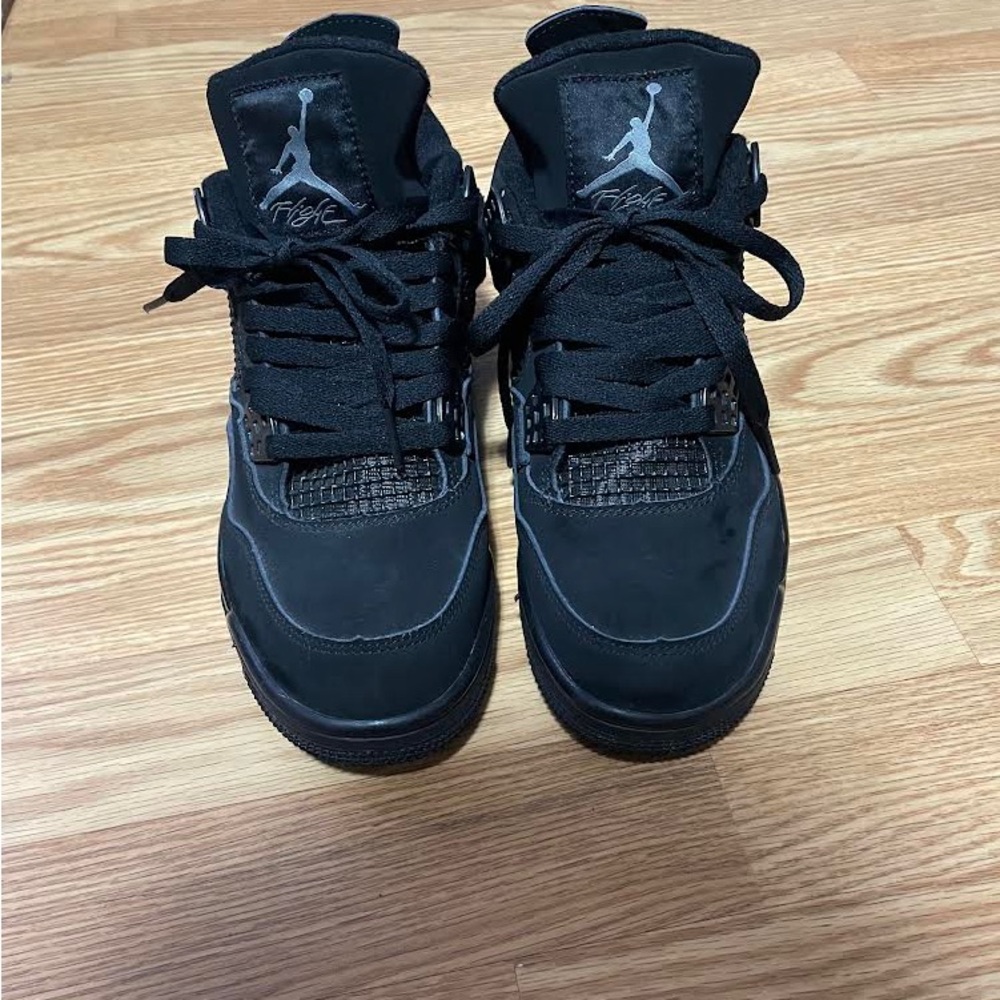 - Jordan 4 black cat